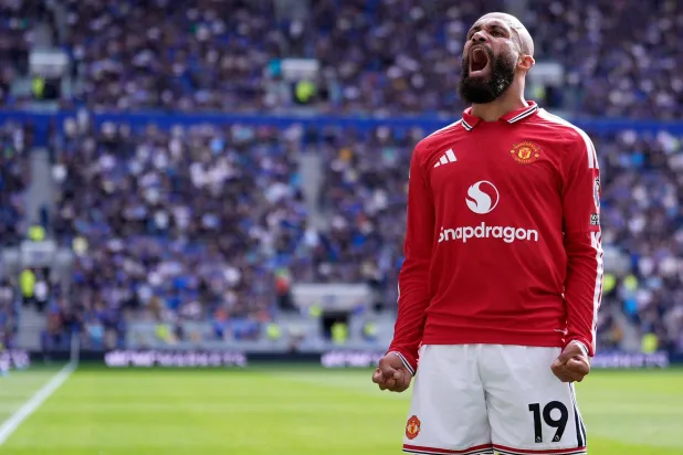 06 September 2026, United Kingdom, Liverpool: Manchester United's Bryan Mbeumo celebrates scoring his side's first goal during the English Premier League soccer match between Everton and Manchester United at Hill Dickinson Stadium. (dpa)