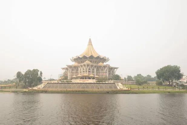 Haze shrouds the Sarawak Legislative Assembly building in Kuching, capital of the Malaysian state of Sarawak on the island of Borneo, on September 5, 2026. (AFP)