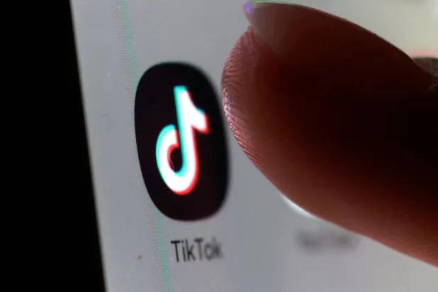 The TikTok app icon on a smartphone in this illustration taken October 27, 2025. (Reuters)