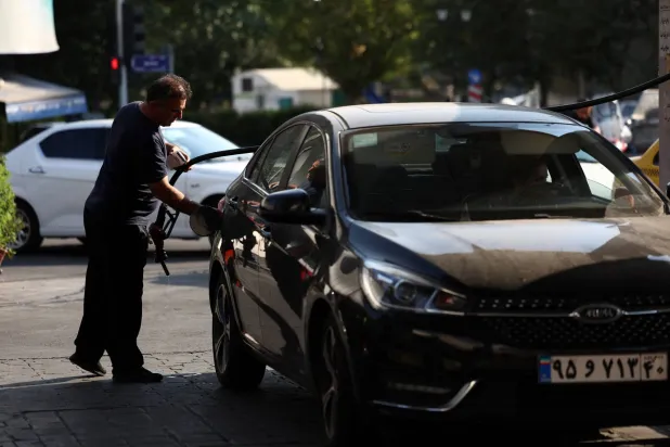 An Iranian man fills his car, on the verge of the rise in gasoline prices in Iran, at a gas station in Tehran, Iran, September 7, 2026. Majid Asgaripour/WANA (West Asia News Agency) via Reuters