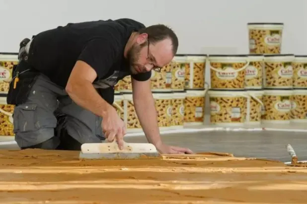 The peanut butter had to be spread as smoothly as possible, without lumps. AFP