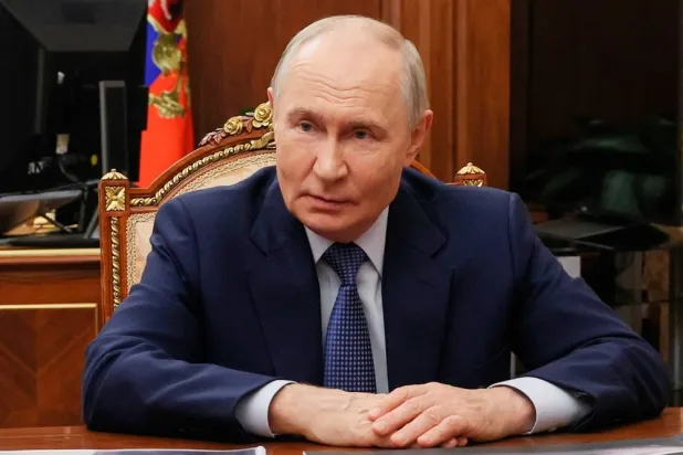 Russian President Vladimir Putin listens to acting governor of Tver region Vitaly Korolyov during their meeting at the Kremlin in Moscow, Tuesday, Sept. 8, 2026. (Mikhail Metzel, Sputnik, Kremlin Pool Photo via AP) 