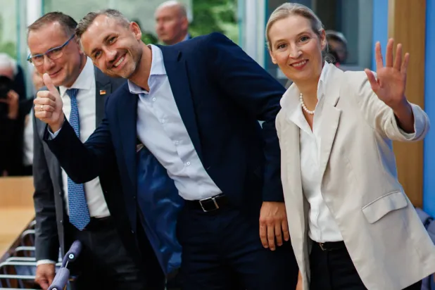 (L-R) Alternative for Germany (AfD) party and parliamentary group co-chairman Tino Chrupalla, top candidate of the AfD party in Saxony-Anhalt Ulrich Siegmund, and AfD party and parliamentary group co-chairwoman Alice Weidel pose for the media during a press conference in Berlin, Germany, 07 September 2026. (EPA)