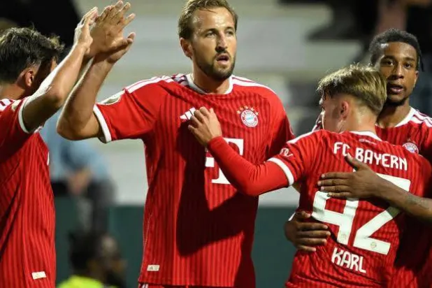 Bayern Munich striker Harry Kane celebrates after scoring in the German Cup. INA FASSBENDER / AFP/File
