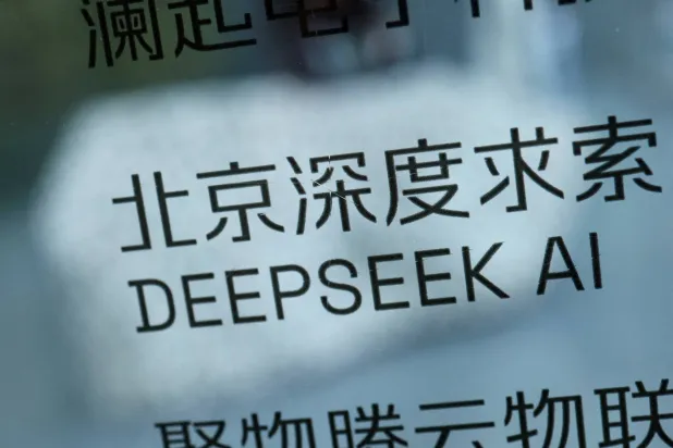 A DeepSeek AI sign is seen at a building where the Chinese start-up's office is located in Beijing, China, February 19, 2025. REUTERS/Florence Lo