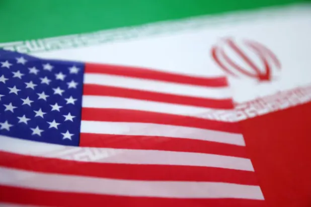 US and Iran flags are seen in this illustration taken June 18, 2025. REUTERS/Dado Ruvic/Illustration/File Photo
