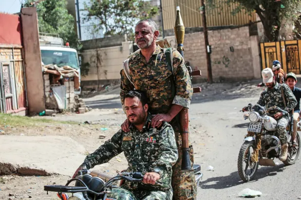 Houthi militants ride a motorbike during a mobilization campaign in Sanaa, Yemen, Thursday, Sept. 10, 2026. (AP)