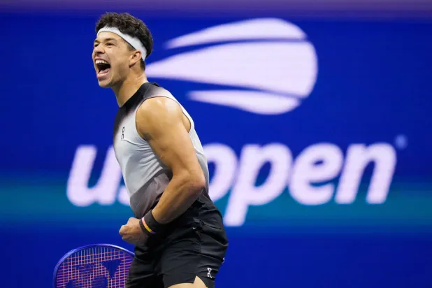 Ben Shelton, of the United States, reacts during the second set during the men's singles semifinals of the US Open tennis championships against Frances Tiafoe, of the United States, Friday, Sept. 11, 2026, in New York. (AP Photo/Frank Franklin II)