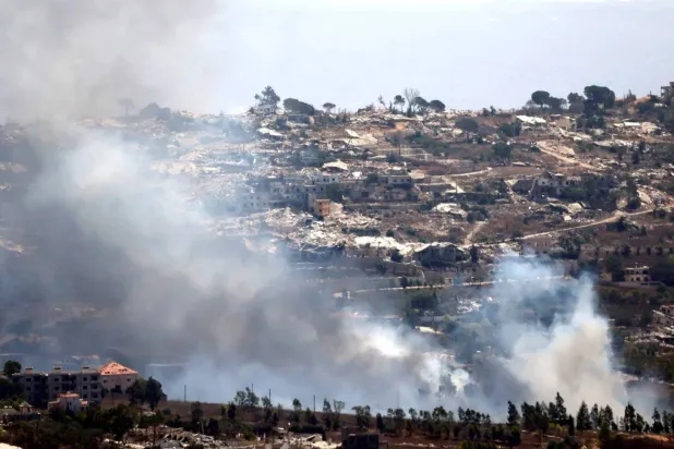 Smoke rises after Israeli demolition operations targeted the occupied southern Lebanese town of Khiam (AFP)