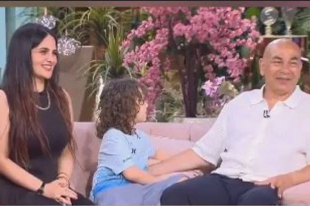 حسام حسن وزوجته في أحد البرامج (إكس)