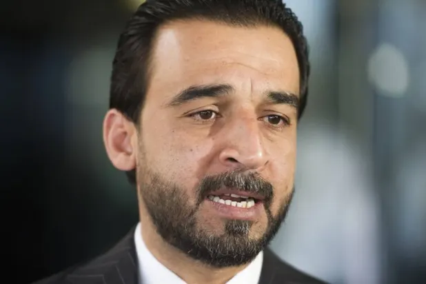 Iraqi Speaker of parliament Mohammed al-Halbousi speaks with the news media as he departs the Department of State after meeting with Secretary of State Mike Pompeo, in Washington, on March 28, 2019. (AP)
