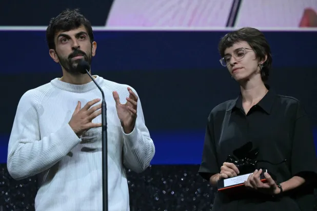 Director Yuval Abraham and Director Rachel Szor receive the Special Jury Prize for "NAZA" during the closing ceremony of the 63rd Venice Film Festival at Venice Lido on September 12, 2026. (AFP) 