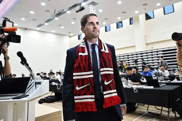 South Korea's interim coach Robert Moreno of Spain leaves a press conference at the Korea Football Association in Cheonan on September 14, 2026. (AFP)