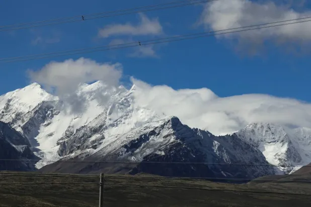 Snow-covered peaks of the Himalayas are seen during a media tour, from Shigatse, Tibet autonomous region, China, Sunday, Sept. 6, 2026. (Tingshu Wang/Pool Photo via AP) 