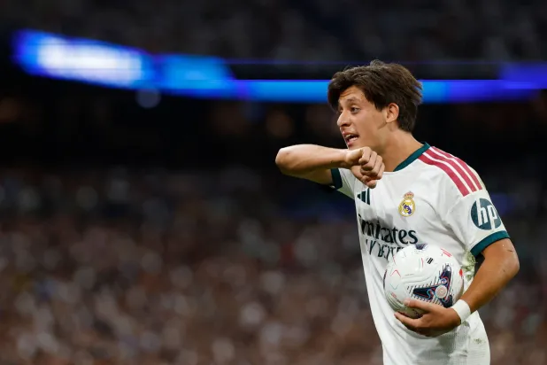 Real Madrid's Turkish midfielder #15 Arda Guler reacts during the Spanish league football match between Real Madrid CF and Rayo Vallecano de Madrid at Santiago Bernabeu Stadium in Madrid on September 12, 2026. (AFP) 