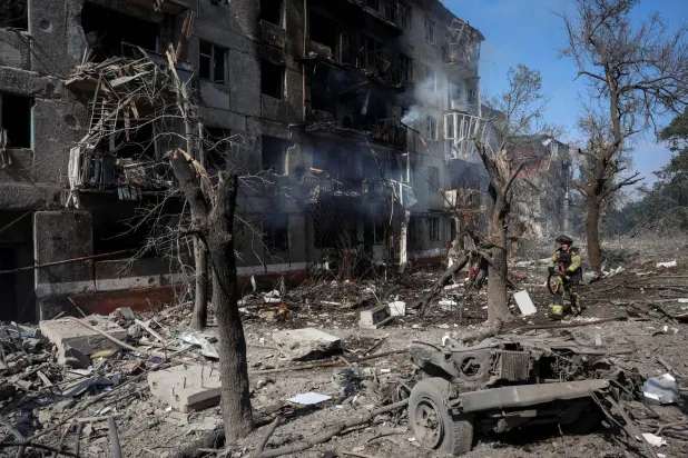 A rescuer works at a site of an apartment building damaged during a Russian air strike, amid Russia's attack on Ukraine, in the frontline city of Kramatorsk, Ukraine September 13, 2026. (Reuters) 