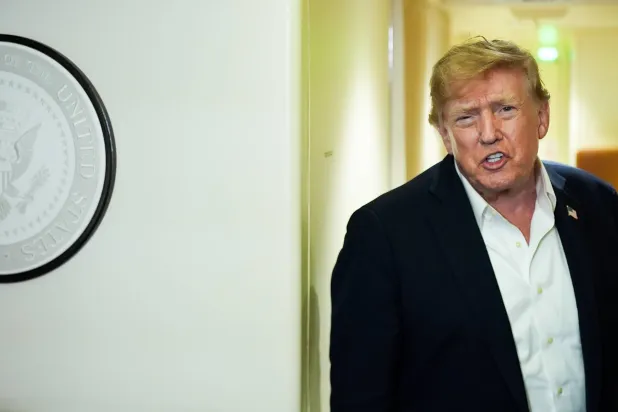 President Donald Trump speaks with reporters while in flight on Air Force One from Shannon, Ireland to Joint Base Andrews, Md., Sunday, Sept. 13, 2026. (AP) 