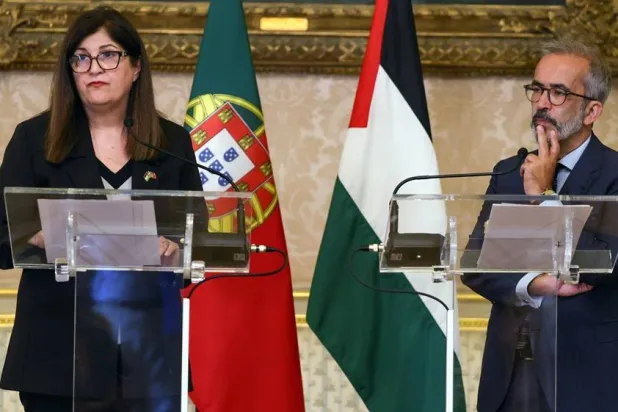 Palestinian Foreign Affairs and Expatriates Minister Varsin Aghabekian Shahin (L) and Portuguese Foreign Minister Paulo Rangel (R) attend a press conference after a meeting at Necessidades Palace in Lisbon, Portugal, 14 September 2026. (EPA)
