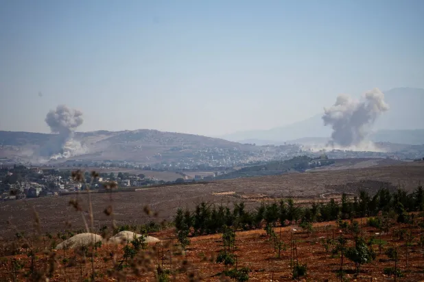  Smoke rises in southern Lebanon following an Israeli strike, as seen from Zawtar al-Gharbieh, southern Lebanon, September 13, 2026. (Reuters)
