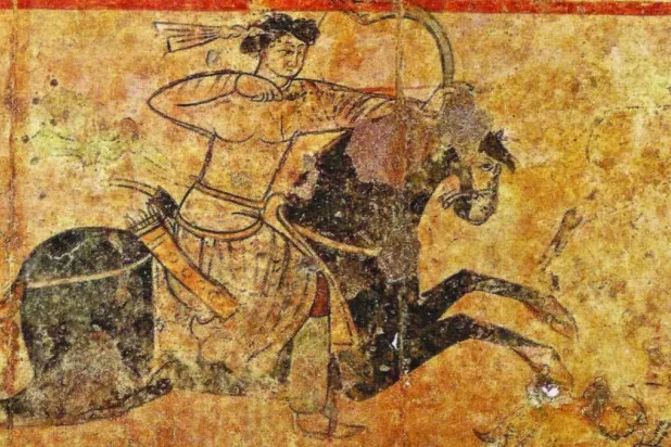 صياد غزلان في لوحة أموية من قصر الحير الغربي