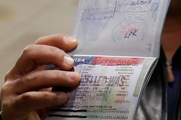 Pasaportta iptal edilmiş bir ABD vizesi (Reuters- Arşiv)