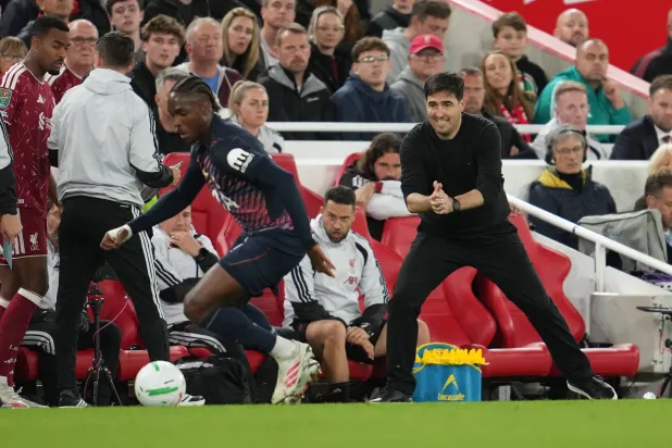 Tottenham's head coach Roberto De Zerbi reacts during the third-round English Football League soccer match between Liverpool and Tottenham in Liverpool, England, Tuesday Sept. 15, 2026. (AP Photo/Jon Super)