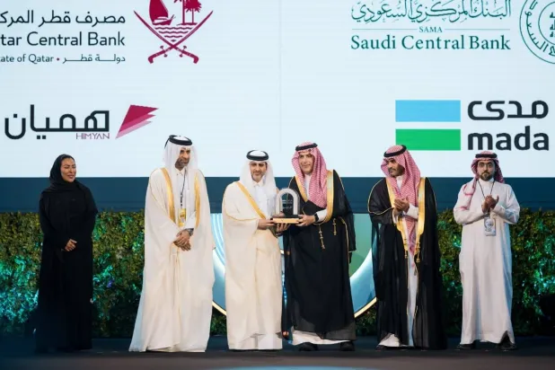 أثناء مراسم إعلان اتفاقية البنك المركزي السعودي ومصرف قطر المركزي (الشرق الأوسط)