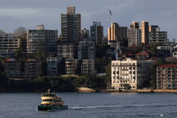 A ferry passes in front of apartments in Sydney, Australia, August 18, 2026. (Reuters)