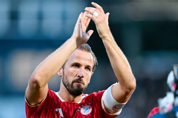 Munich's Harry Kane applauds after the German Bundesliga soccer match between SV Elversberg and FC Bayern Munich in Elversberg, Germany, Sunday, Sept. 13, 2026. (Uwe Anspach/dpa via AP)