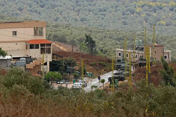 Lebanese soldiers deploy on the outskirts of Deir Mimas in southern Lebanon after Israeli forces advanced toward the town, positioned tanks, and threw stun grenades (AFP)
