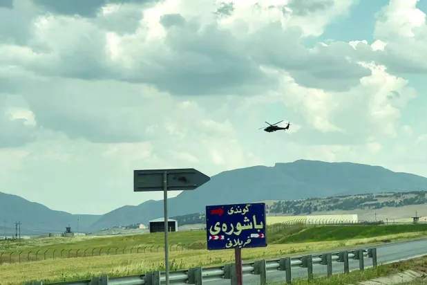 An American helicopter flies near the Harir Air Base in Erbil, Iraqi Kurdistan (Rudaw file photo)