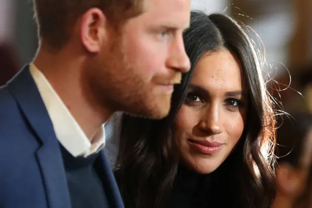 FILED - 13 February 2018, United Kingdom, Edinburgh: FILE PHOTO - Prince Harry and Meghan, Duke and Duchess of Sussex, attend a reception for young people at Holyroodhouse Palace in Edinburgh. Photo: Andrew Milligan/PA Wire/dpa