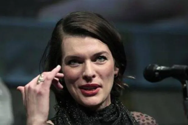 Cast member Milla Jovovich speaks during a panel for "Resident Evil: Retribution" during the Comic Con International convention in San Diego, California July 13, 2012. REUTERS/Mario Anzuoni/Files