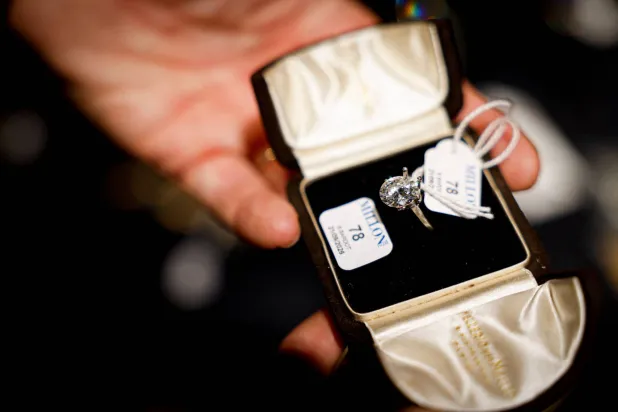 This photograph shows a family ring belonging to Brigitte Bardot a preview exhibition of personal belongings once owned by late French actress Brigitte Bardot at Hotel Drouot in Paris on September 15, 2026, ahead of an auction of her memorabilia and clothing. (AFP) 