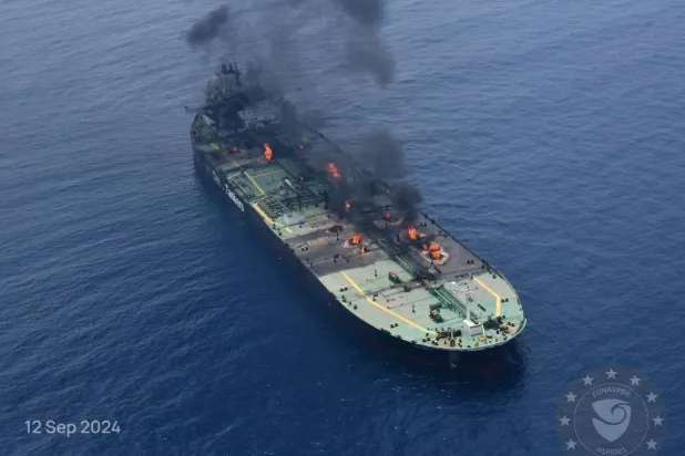 FILE PHOTO: Flames and smoke rise from the Greek-flagged oil tanker Sounion, which has been on fire since August 23, after an attack by Houthi militants, on the Red Sea, September 12, 2024 in this handout image. EUNAVFOR ASPIDES/Handout via REUTERS 