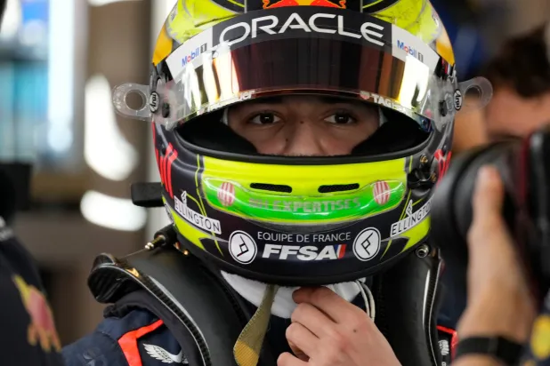 FILE - Red Bull driver Isack Hadjar prepares for the first practice ahead of the Abu Dhabi Formula One Grand Prix at the Yas Marina Circuit, Abu Dhabi, UAE, on Nov. 24, 2023. (AP Photo/Kamran Jebreili, File)