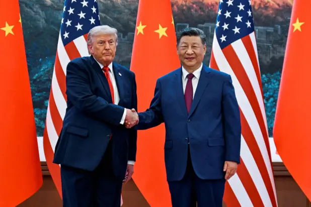 ABD Başkanı Donald Trump, 14 Mayıs’ta Pekin’de Çin Devlet Başkanı Şi Cinping ile görüşmesi sırasında (Reuters)
