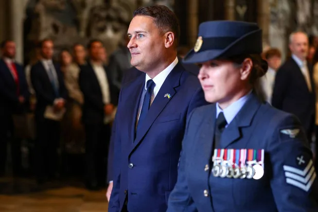 Britain's Defence Secretary Wes Streeting (L) attends a 'Service of Thanksgiving and Rededication' to mark the 86th anniversary of Battle of Britain, at Westminster Abbey in central London on September 20, 2026. (Photo by Peter Nicholls / POOL / AFP)