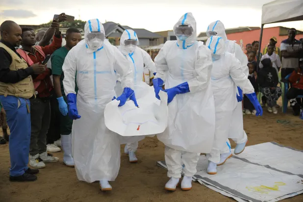 Ebola response teams organize a public demonstration to raise awareness about the Ebola virus disease in Beni, North Kivu province, eastern Congo, Tuesday, Sept. 22, 2026. (AP Photo/Sebastien Kitsa Musayi)
