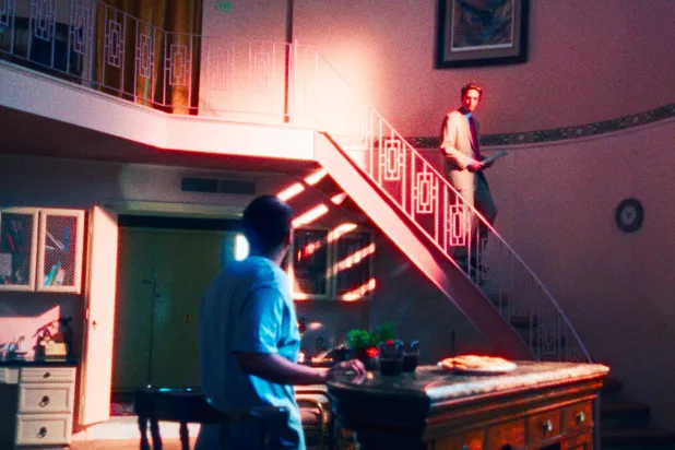  This image released by A24 shows Tony Revolori, left, and Robert Pattinson in a scene from "Primetime." (A24 via AP) 