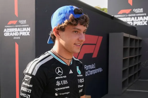 Mercedes driver Andrea Kimi Antonelli of Italy walks through the paddock ahead of the Azerbaijan F1 Grand Prix, in Baku, Azerbaijan, Wednesday, Sept. 23, 2026. (AP Photo/Darko Bandic)