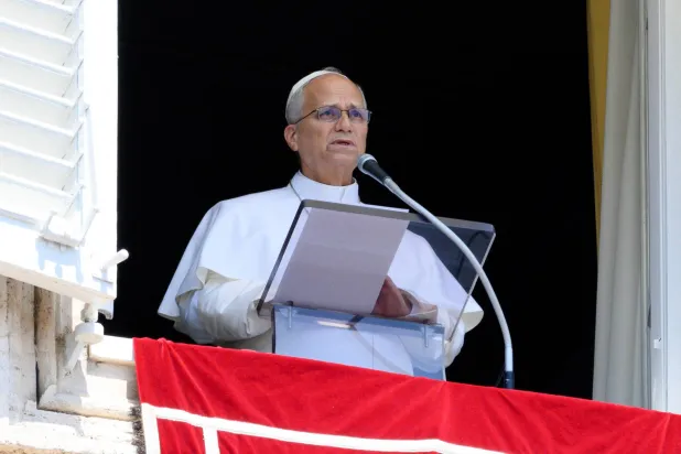 Pope Leo XIV leads the weekly Angelus prayer from a window at the Vatican, August 9, 2026. Vatican Media/Mario Tomassetti/­Handout via REUTERS