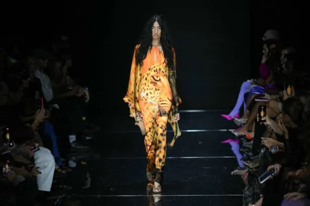 A model walks the runway during the Roberto Cavalli collection show as part of Women's Spring/Summer 2027 Milan's fashion week, on September 24, 2026. (AFP)