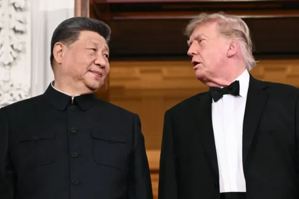 Çin Devlet Başkanı Şi Cinping ve ABD Başkanı Donald Trump, Beyaz Saray’daki resmi akşam yemeği öncesinde (AFP)