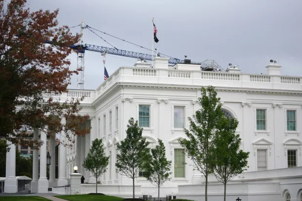 The White House is photographed, Sunday, Sept. 27, 2026, in Washington. (AP Photo/Allison Robbert)