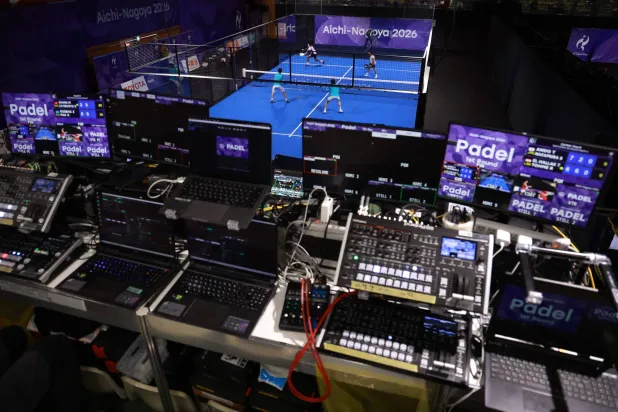 Technical equipment is seen as Hong Kong's Mohammed Khan and Sean Lo Escoto (top) play against Kazakhstan's Zhakas Kozbak and Rodion Pak during the men's pairs padel first round match at the Nagoya City Highashi Sports Center in Nagoya on September 28, 2026. (Photo by DAVID GRAY / AFP)