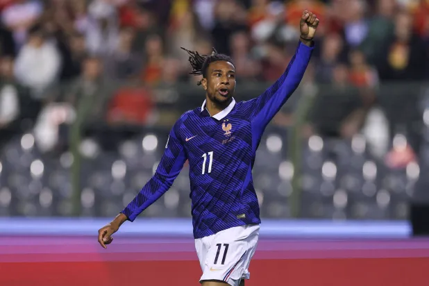  France's midfielder #11 Michael Olise celebrates scoring his team's first goal during the UEFA Nations League Group A1 football match between Belgium and France at King Baudouin Stadium in Brussels on September 28, 2026. (AFP) 