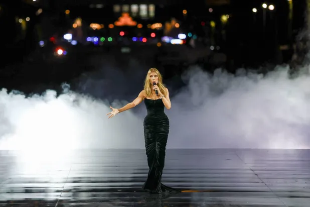  Celine Dion performs during a public show named "Express Your Worth", organized by French cosmetics group L'Oreal at Place Joffre during Paris Fashion Week in Paris, France, September 28, 2026. (Reuters)