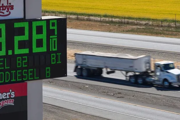  A semi drives past a sign advertising the price of diesel along Interstate 5 in Williams, California, US, September 28, 2026. (Reuters)