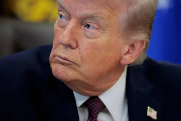 US President Donald Trump attends the signing ceremony for an executive order on mail ballots, in the Oval Office of the White House in Washington, DC, March 31, 2026. (Reuters)